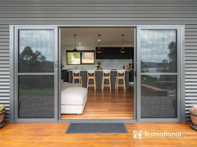 North Facing Coastal Living with Sweeping Channel Views New Build, Nothing Left to Do!