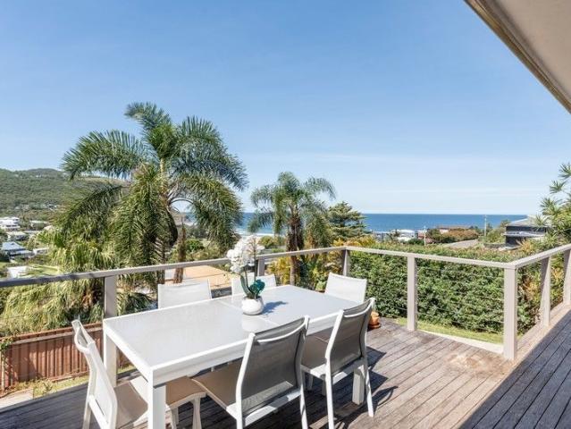 North Facing Coastal Retreat with Panoramic Ocean Views