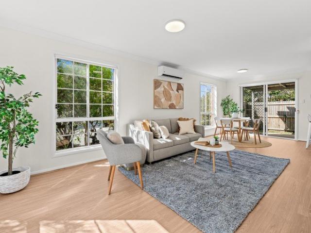 North Facing Corner Townhouse Beautifully Renovated Throughout!