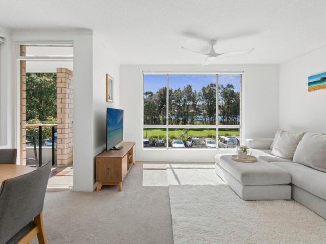 North facing beachside apartment with lagoon views