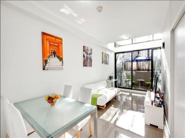 North Facing Dual Level Apartment with Secure Parking