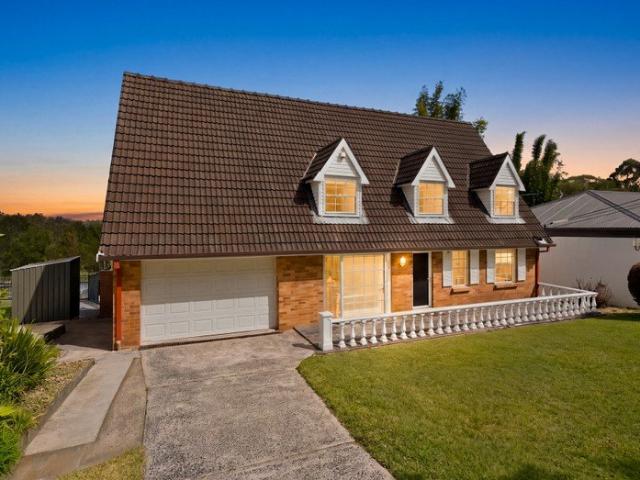 North Facing Four Bedroom Home with Pool, Deck and Serene Bushland Views