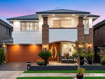 North Facing Family Masterpiece with Downstairs Bed & Bath in the Heart of Elara Estate