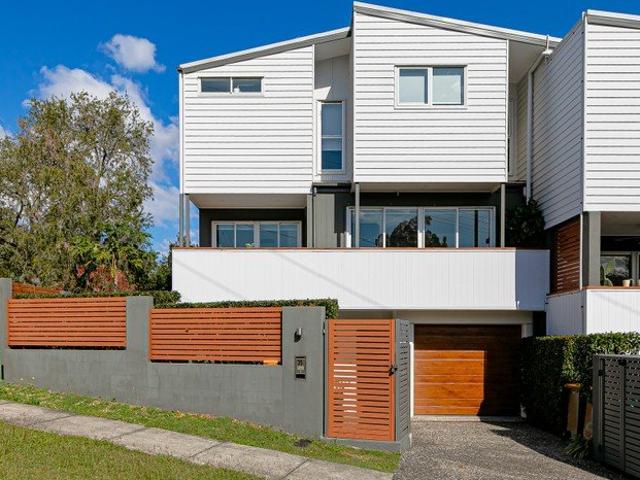 Freehold North Facing Townhouse with Private Courtyard in Desirable Alderley