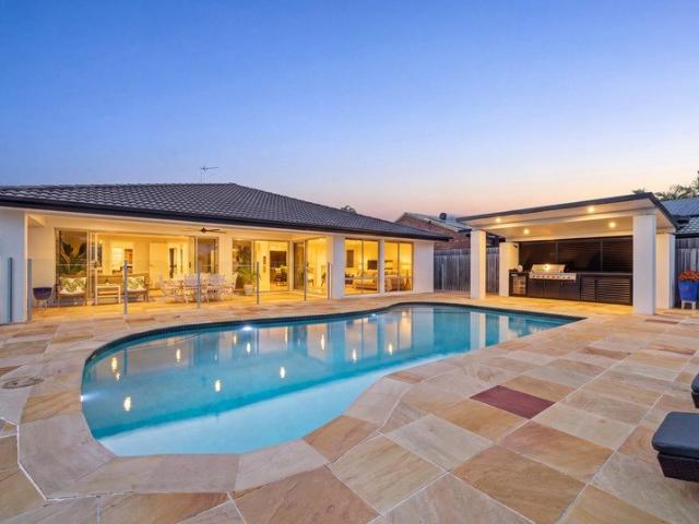 North Facing Waterfront Living | Single Level Ease | Poolside Entertaining