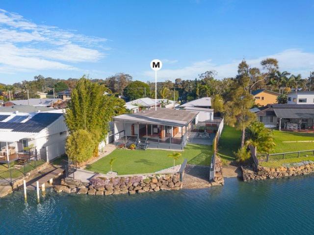 North facing waterfront living with direct boat access