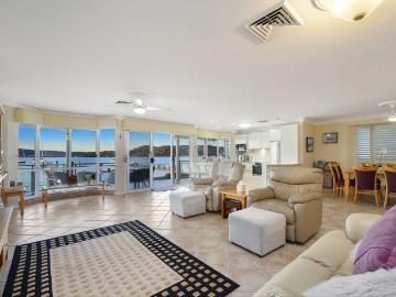 North Facing Waterfront Retreat with Private Jetty