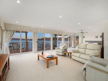 North Facing Waterfront Retreat with Private Jetty