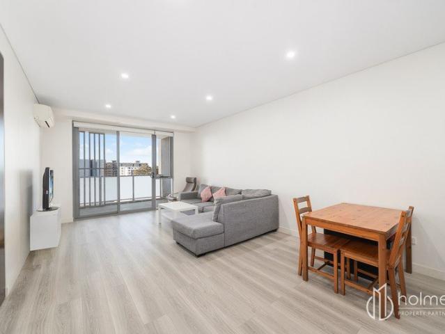 North Facing Two Bedroom Apartment with Rare Side by Side Double Parking