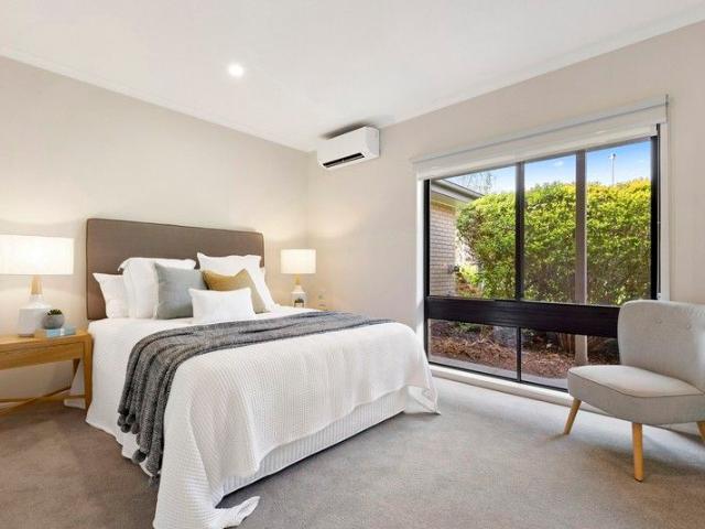 North facing two bedroom villa with private backyard