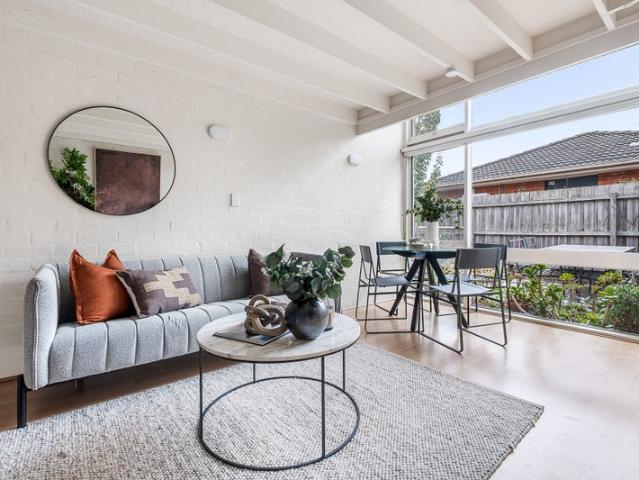 North Facing Two Level Living in the Heart of Malvern