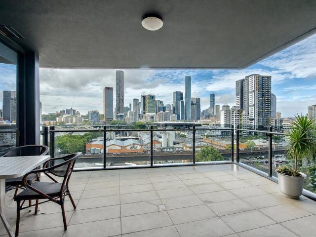 Northeast Corner Apartment with Panoramic River & City Views