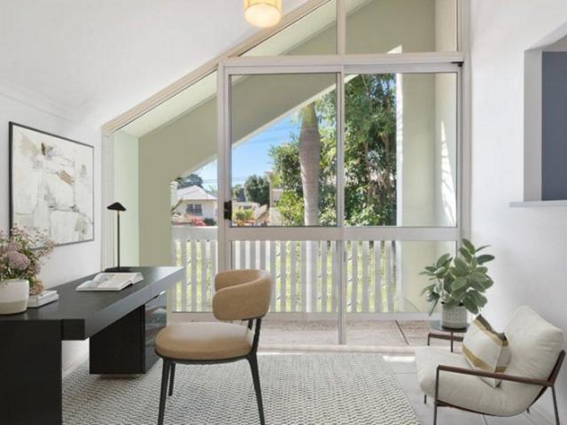 Not Quite a Townhouse, Not Your Typical Apartment