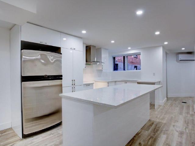 Notre Dame de Grâce Montreal House for Rent on Rue Addington Expansive 2 Bedroom, 1 Bath with New Kitchen and Fireplace