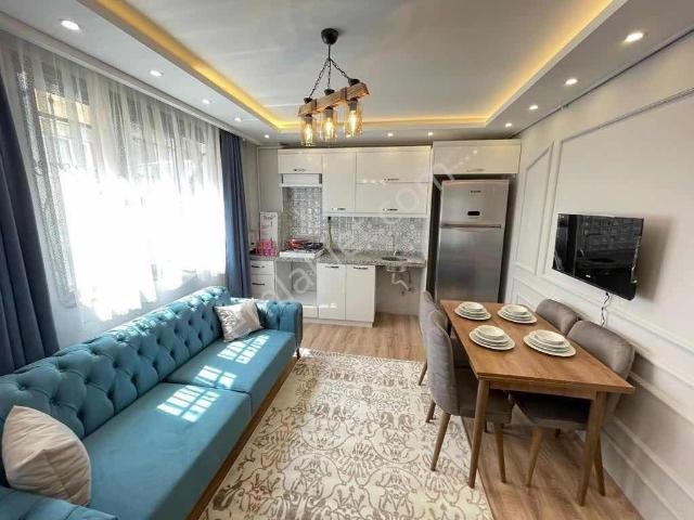 Novas'dan 1+1 Giriş Katı Cadde Yakını Full Eşyalı Otoparklı