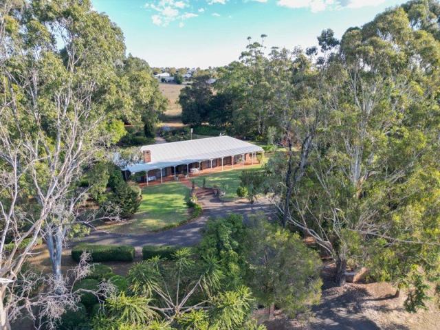 Huge Highfields Home on 2.2 Acres with HEAVY VEHICLE STORAGE. Also subdivision potential and flourishing landscaped gardens