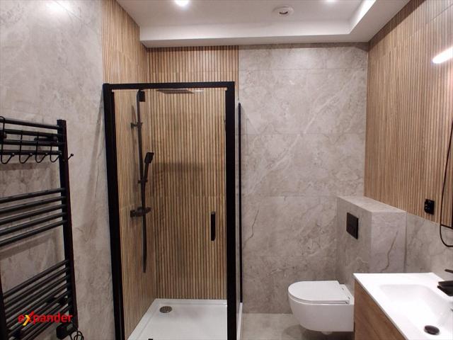 Wynajmę nowoczesny 50 m² apartament z klimatyzacją i parkingiem