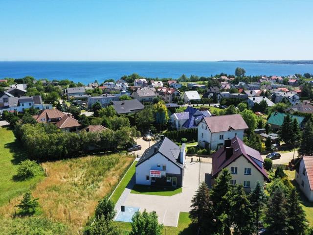 Nowoczesny apartament nad morzem z miejscem postojowym