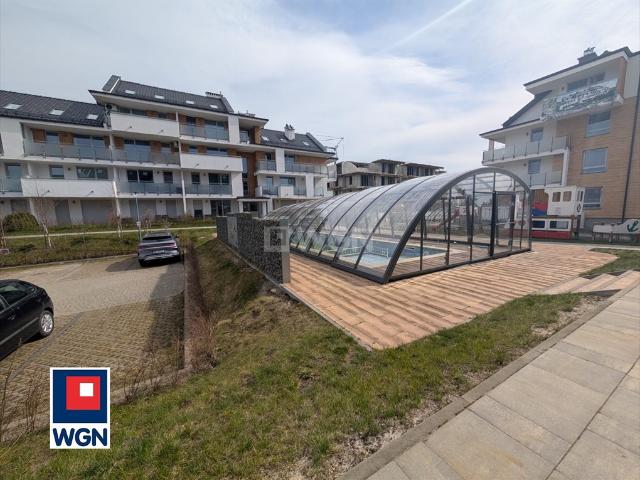 Nowoczesny apartament z ogródkiem i basenem w Sztutowie