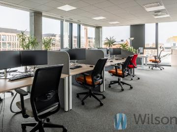 Nowoczesny biurowiec na Pradze z open space i garażem