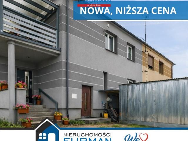 Nowoczesny bliźniak z ogrzewaniem pellet i fotowoltaiką