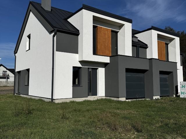 Na sprzedaż nowoczesny bliźniak 125 m² z garażem i działką 650 m²