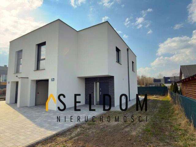 Nowoczesny bliźniak 131 m² z garażem i ogrodem