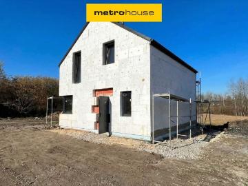 Nowoczesny dom 100 m² z kominkiem i energooszczędnym ogrzewaniem