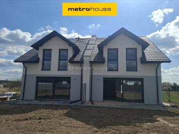 Nowoczesny dom 128m² z garażem i dużą działką w Masłowie
