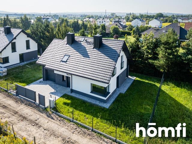 Zapraszam do obejrzenia nowoczesnego domu 137 m² z garażem i ogrodem