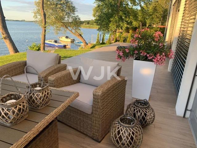 Nowoczesny dom 160 m2 z własną linią brzegową w Rydzewie