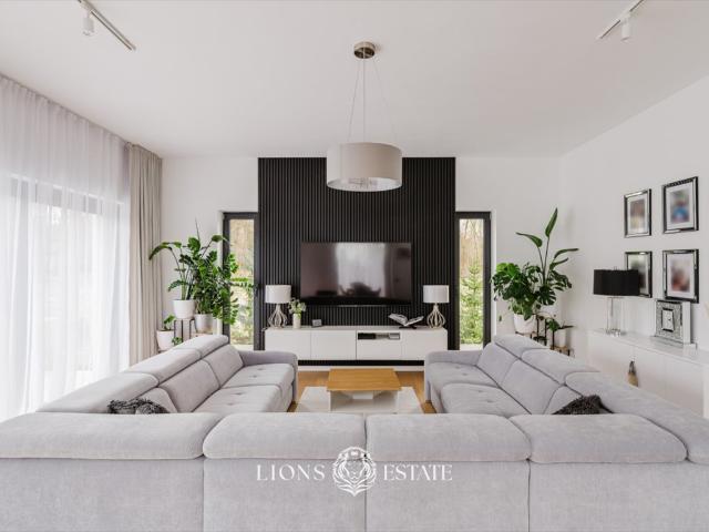 Do sprzedania nowoczesny dom 221 m² z antresolą i ogrodem
