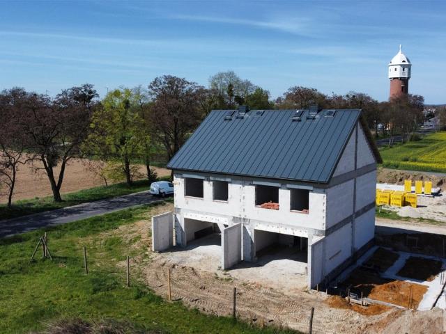 Nowoczesny dom z pompą ciepła, garaż i 4 pokoje