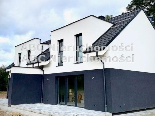 Nowoczesny dom z pompą ciepła, 74 m2, garaż