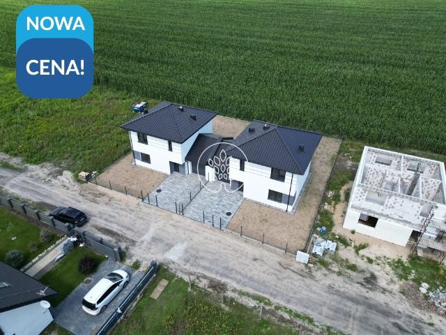 Nowoczesny dom bliźniaczy 126 m² z ogrodem i garażem