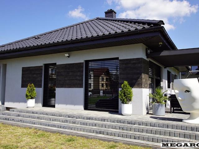 Do sprzedania nowoczesny dom parterowy 100 m² z kominkiem