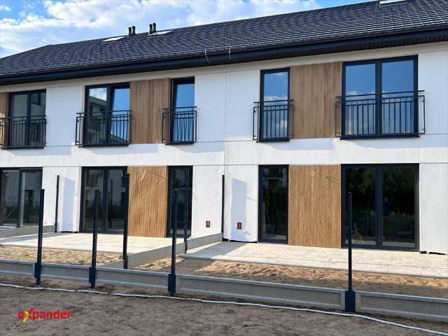 Do sprzedania nowoczesny segment 173 m² z ogródkiem i garażem