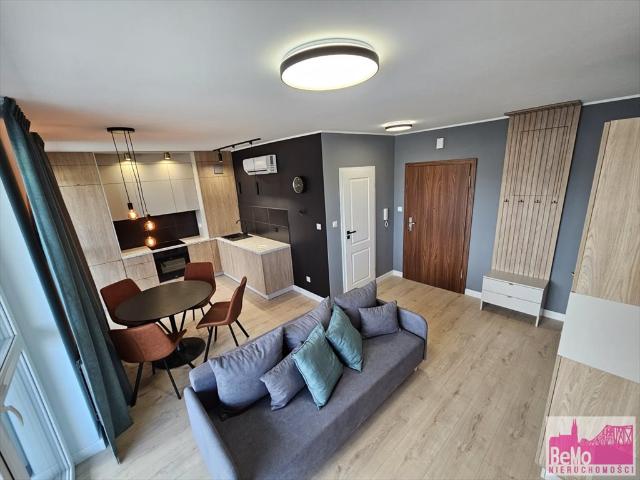 Nowoczesny 2 pokojowy apartament z tarasem i parkingiem