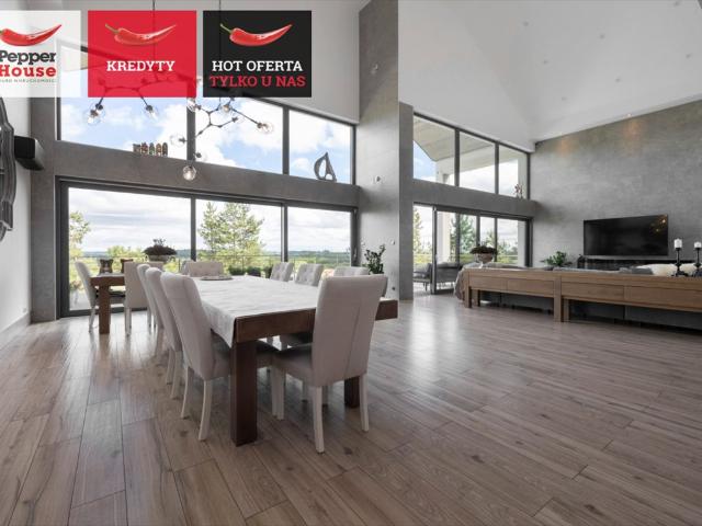 Zapraszam do obejrzenia nowoczesnej rezydencji 320 m² z panoramicznymi przeszkleniami