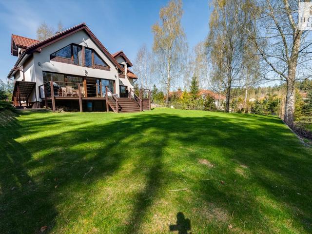 Zapraszam do nowoczesnej rezydencji 352 m² w sercu natury Warmii