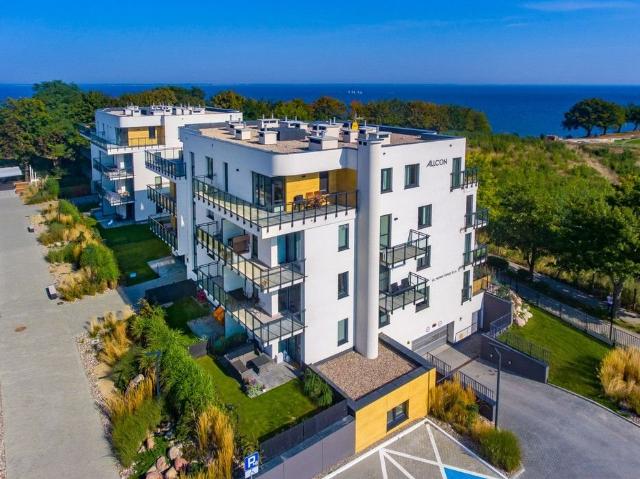 Sprzedam nowoczesne studio 26 m² blisko morza z patio i parkingiem