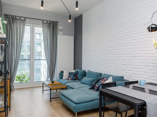 Nowoczesne z balkonem i miejscem w garażu 61.9 m²