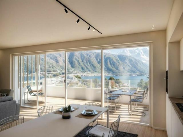 NUOVI MODERNI 4.5 LOCALI CON GIARDINO E VISTA LAGO A MELIDE