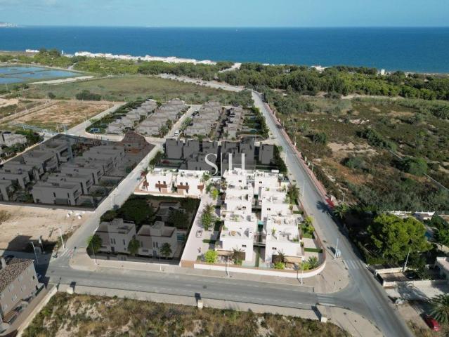 Nuevas villas adosadas junto al mar en La Marina Playa El. 98m² La Marina