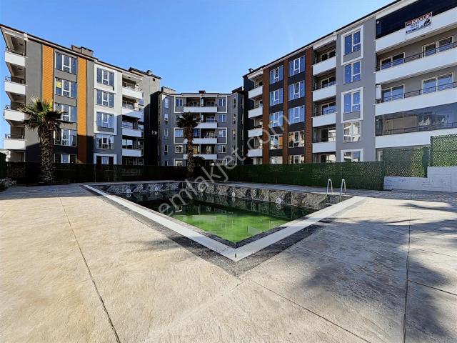 Oğuz Gürel'den Körfez'de Eşyalı Kiralık 1+1