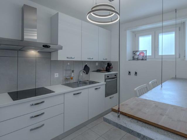 OCCASIONE AMPIO 3.5 LOCALI CON BALCONE A LUGANO FIGINO