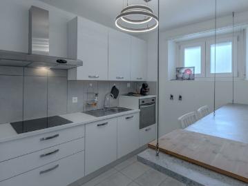 OCCASIONE AMPIO 3.5 LOCALI CON BALCONE A LUGANO FIGINO