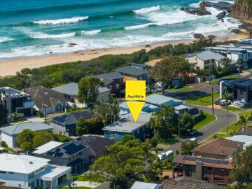 UPDATED PRICE! Ocean Views, Renovated Living and the Jones Beach Lifestyle The Coastal Family Home You've Been Waiting For