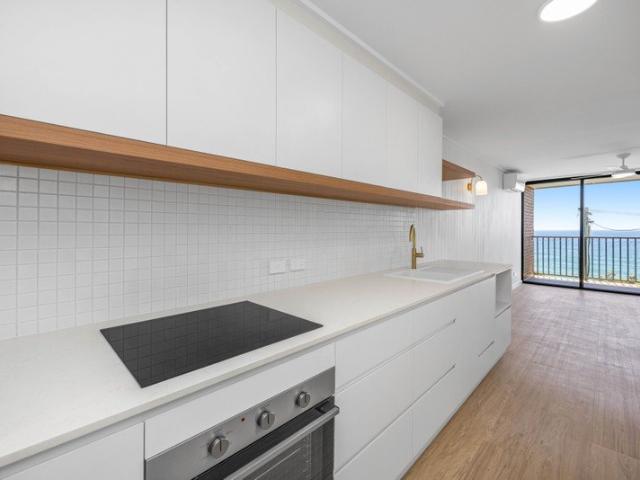 Oceanfront Living Renovated Apartment with Coastal Views