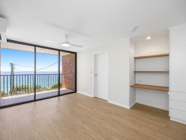 Oceanfront Living – Renovated Apartment with Coastal Views